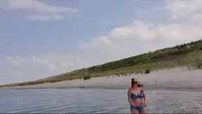 Uncensored. It's a hot summer day we are on the beach. You brought a frisbee so let play with that. Meanwhile i take off my bikini top. Maybe you get better at throwing the frisbee.
