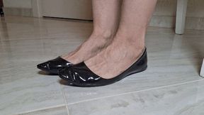 Toe wiggling in patent leather black ballet flats 8