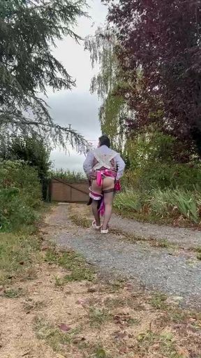 In a gardener outfit with a pink dress for a day
