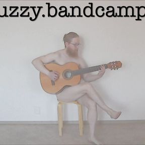 DJ Phuzzy plays guitar naked