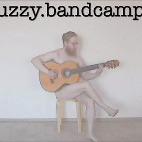 DJ Phuzzy plays guitar naked