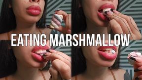 eating marshmallow