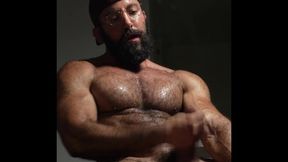 Unshaved bearded muscle boy with an uncircumcised massive stiffy