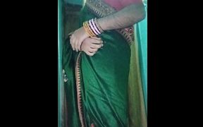 Indian Gay Crossdresser Gaurisissy in Green Saree Pressing Her Big Boobs and Fingering in Her Ass