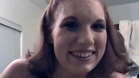 A fiery redhead works her magic sucking that small cock