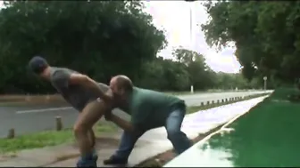 Daddy and younger man bareback fucking outdoors by the road