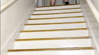 Mrs. A pissings on the stairs