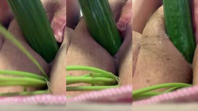 Tight pink pussy stuffed with cucumbers and carrots