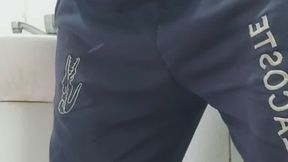 A well-endowed man urinating and showing off his big, thick penis.