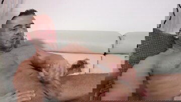 Bulky woolly guy alone strokes fatty dick alone