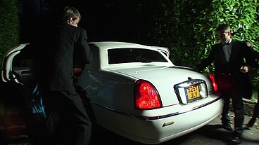 Savannah takes it hard from behind as she drapes her leg over the rear trunk of the car...