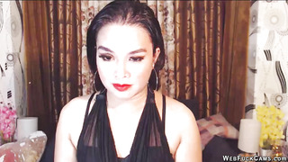 Brunette amateur in black on webcam
