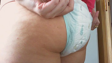 Dirty swollen diaper while I cook