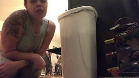Tiny man accidentally falls into trash can