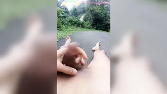 Young Indian guy oils up and jerks his big cock on a busy public street