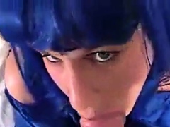 Blue wig crossdresser blowing