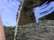 Sit down and pee in river/stream