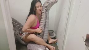 Inflatable dino ride in bathroom