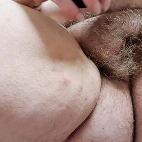 BBW playing with wet spread hairy pussy and dildo