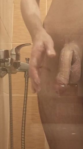 A Young Guy Washes in the Shower and Dreams of Someone Being Next to Him