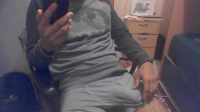 The man left alone at home watches porn on his phone and cums