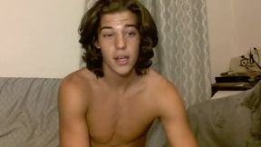 Tarzan Looking Twink on Couch Showing Off Body