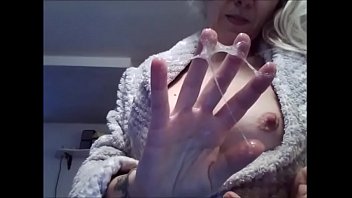 my step aunt spits on her magnificent boobs and on her ...