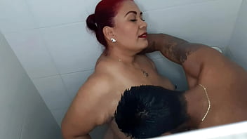 A hot shower with my stepmom, she gives me a handjob with her tits