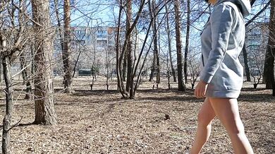 I walk bottomless next to a busy street