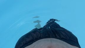 Huge boner in black satin shorts in public pool