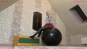 Fun jumping on a big pink beach ball and a black fitball