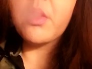 SMOKING FETISH:  Capri smokes again.
