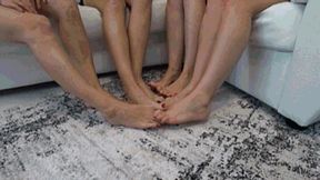 4 gerls crossed legs and interlocking their toes together FP