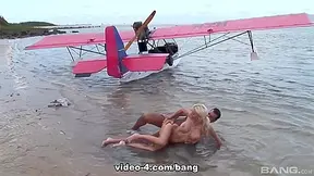 Fucks A Pilot On A Secluded Island Beach With Caylian Curtis