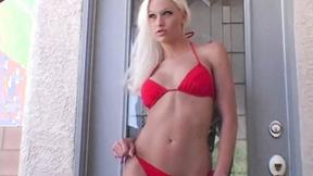 Stripteasing blonde teen shows off her body