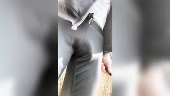 Gay daddy shows off big cock bulge in public park