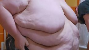SSBBW SQUEEZES INTO TIGHT SWIM SUIT WITH HELP FROM FWB