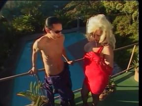 Blonde shemale gets bent over and fucked in the ass