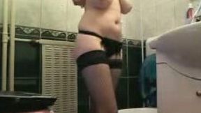 Brunette webcam hussy pees and plays with her big natural tits