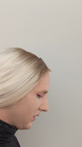 Crossdresser and Woman Putting on Eyeliner   Clip 1