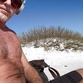 Rubbing my big cock on the beach until I blow my load