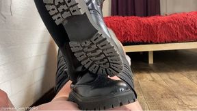 Trampling and stomping slave's useless body with My rough soled boots