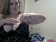 Huge DDD tit wife smokes while playing with her big tits and hard nipples