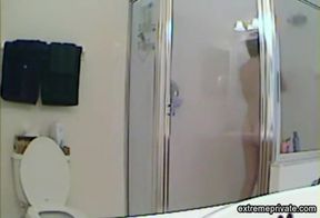 MILF stepmother spied in the shower