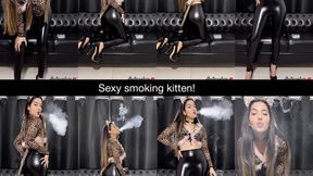 Sexy smoking kitten in leather pants and heels!