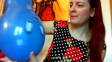 Redhead in polka dot dress rides huge blue dildo to orgasm