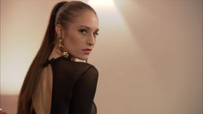 Alexandra Stein Wears a Sheer Catsuit for a Sensual Striptease