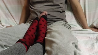 Sockjob in Over Socks with feet balls massage. He edges and cums on socks