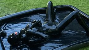 Messy latex encasement girl and the heavy rubber sploshing outdoor session - Part 1 of 2