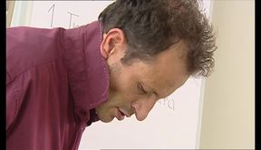 Busty secretary gives a deep blowjob
